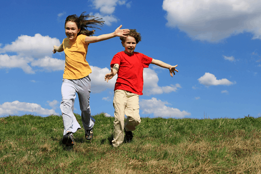 Kids Running in Field - kids chiropractic