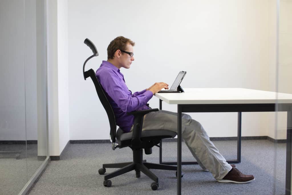 Bad posture working at desk is the opposite of good posture.